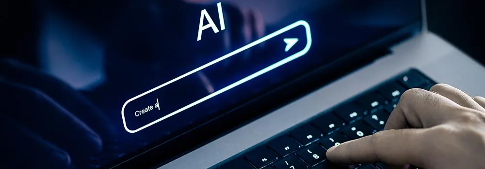 Contractor typing a prompt into an AI assistant on a laptop